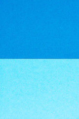 Colorful blue layered paper cardboard background, colors with layers and texture, backdrop with...