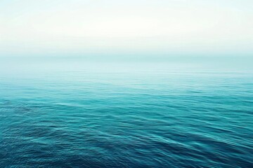 A horizontal gradient of ocean blues, merging into a soft mint green for a refreshing backdrop