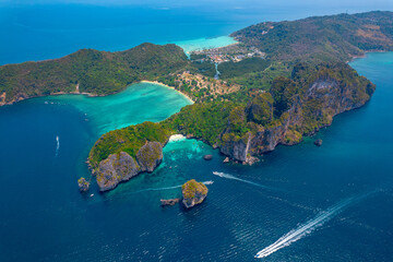 Landscape koh Phi Phi Don island, Nui beach with speed boat in Krabi, Thailand, Aerial drone photo