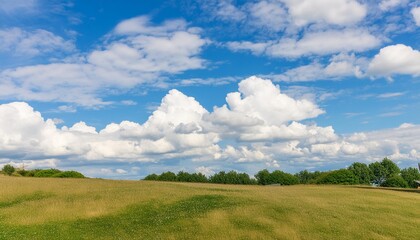 white fluffy clouds on blue sky in summer