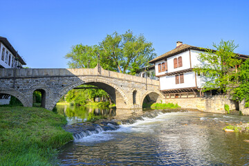 The old bridge and traditional Bulgarian houses in the old town of Tryavna, Bulgaria