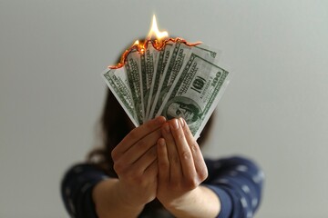 burning dollar bills