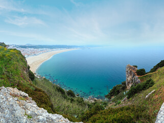 Nazare coast summer misty top view (Portugal). Two shots stitch panorama.    