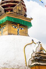 buddha eyes at buddhist style stupa