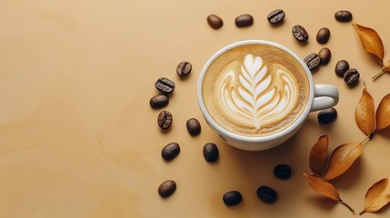   A cup of coffee sits atop a table, flanked by coffee beans and a leaf perched atop