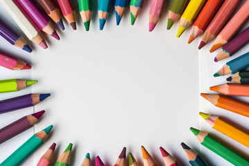 Fototapeta premium Colorful crayons on white background with copy space for text
