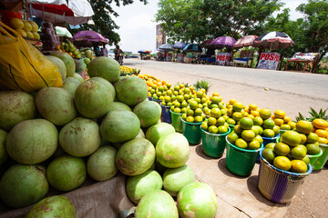 Cross section of a street fruit market in Nigeria