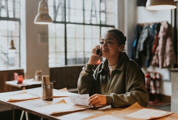 Teenage girl on a phone call at restaurant