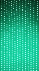 Mint green LED screen texture dots background display light TV pixel pattern monitor screen blank empty pattern with copy space for product design