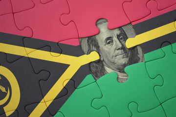 puzzle with the national flag of Vanuatu and usa dollar banknote. finance concept