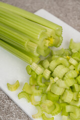 Fresh celery on cutting board ready for meal prep