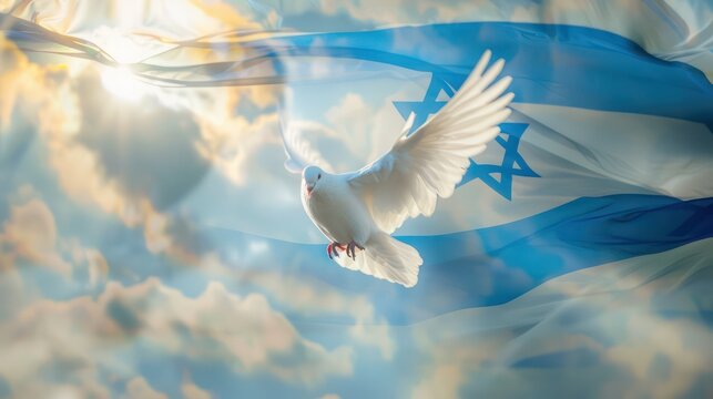 A white dove flying in the sky against the backdrop of the waving Israeli flag. Israel independence day