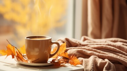 Cup of coffee with autumn leaves on windowsill, closeup