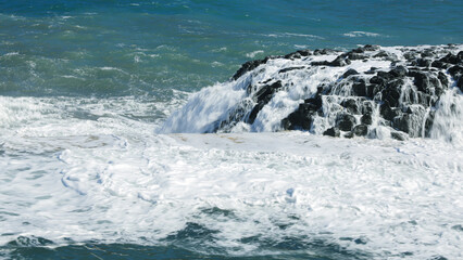 High splashing wave in the ocean