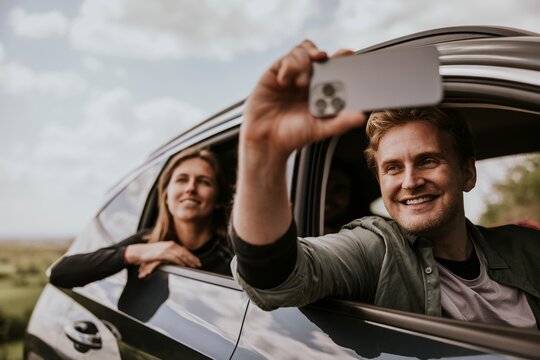 Man recoding video on road trip photo