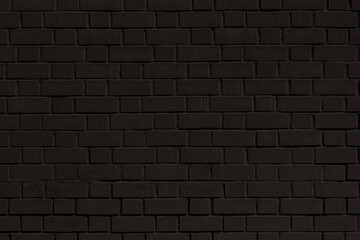 Texture of a black brick wall. Abstract construction background.