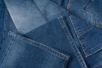 Blue jeans denim texture as a background. Top view.
