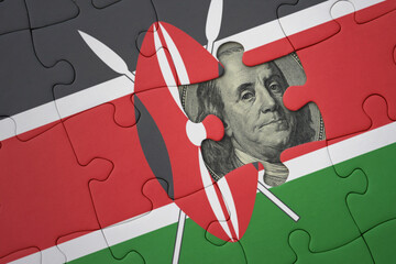 puzzle with the national flag of kenya and usa dollar banknote. finance concept