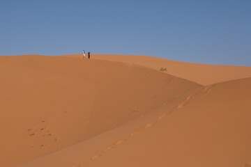 person in the sand dunes Morocco 