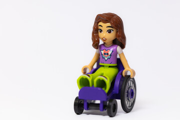 Fototapeta premium Lego Friends disabled girl on wheelchair