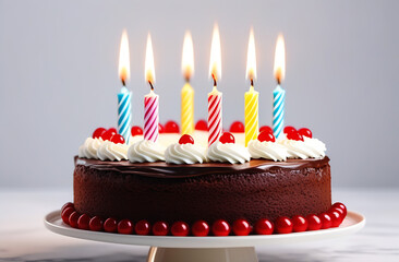 Delicious, beautiful birthday cake with candles isolated on a white background. Birthday