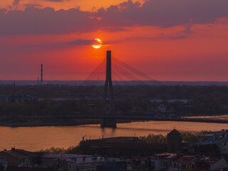 Magical aerial sunset over Riga old town, the capital of Latvia. Riga rooftop view panorama at...