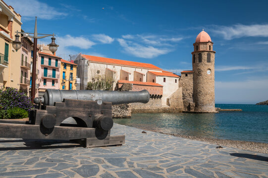 City old town of Collioure in France. Church and old cannon. Village next to Mediterranean sea. Tourism in the south of France. 