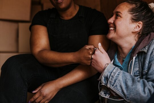 Woman fist bumping, moving service provider