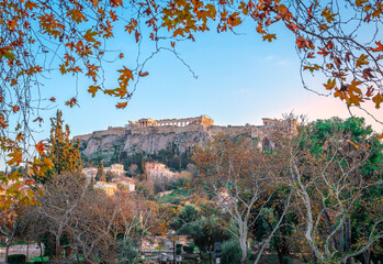 The Ancient Agora with the neighborhood of Plaka and the Acropolis Hill in the background. In...
