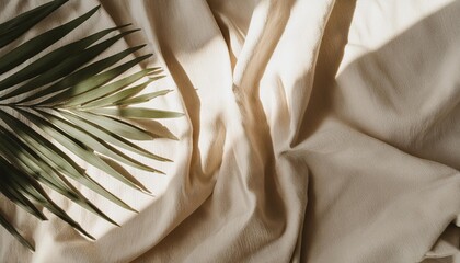 tropical palm leaves blurry sunlight shadows on neutral beige textile aesthetic minimalist summer background