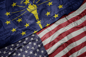 Obraz premium waving colorful flag of united states of america and flag of indiana state on the dollar money background. finance concept.