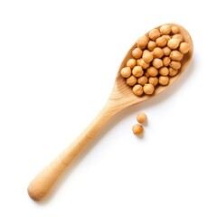 Chickpeas in a wooden spoon isolate on white background, flat lay, close-up