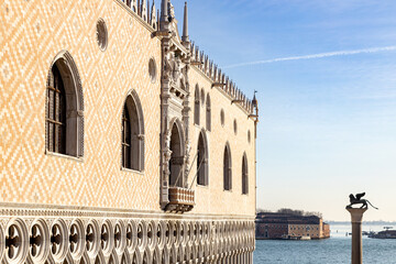 View of Doge's Palace and Columns of San Marco with the statue of the Winged Lion of Venice, Italy