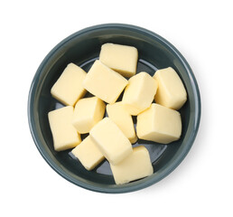 Tasty butter cubes in bowl isolated on white, top view