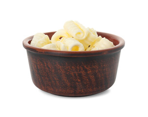 Tasty butter curls in bowl isolated on white