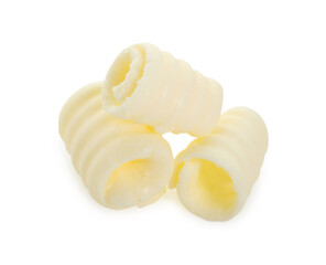 Three tasty butter curls isolated on white