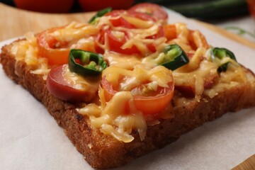 Tasty pizza toast on table, closeup view