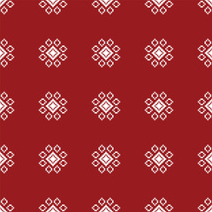 Traditional ethnic motifs ikat geometric fabric pattern cross stitch.Ikat embroidery Ethnic oriental Pixel red background. Abstract,vector,illustration. Texture,christmas,decoration,wallpaper.