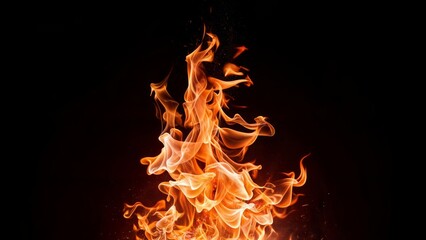 Fototapeta premium Close-up of a crackling bonfire on a jet black background, detailed sparks flying upwards, smoke tendrils illuminated by the firelight. best quality. hyperdetailed.