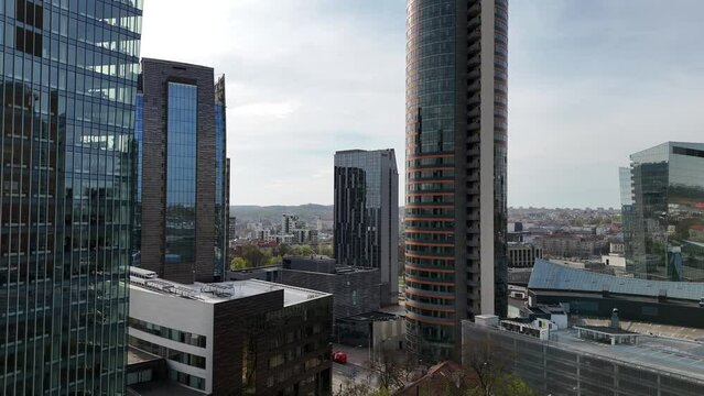 Vilnius Central Business District close up shots from aerial view. Skyscrapers glass reflections. Business development. Vilnius capital city, Lithuania.