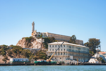 Sunny view of Alcatraz Island in San Francisco Bay. Former federal prison, main cellhouse,...