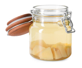 Delicious quince drink in glass jar isolated on white