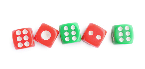 Many green and red game dices isolated on white, top view
