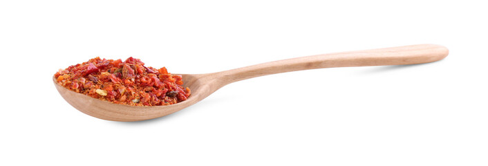 Aromatic spice. Red chili pepper flakes in spoon isolated on white