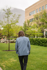 Back of Blue Suit Coat Student College University