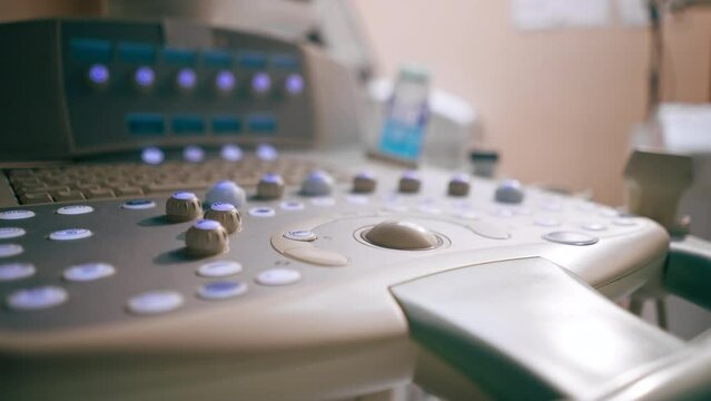 close-up in veterinary clinic panel with different buttons for ultrasound detection