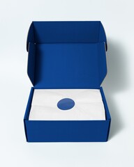 Blank gift card in blue parcel box