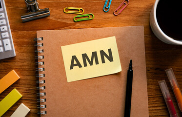 There is sticky note with the word AMN. It is an abbreviation for Artifical Mains Network as...