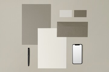 Earth tone corporate identity, professional stationery, business branding, flat lay design