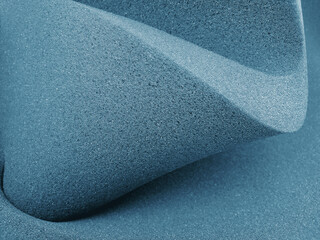 dark blue foam sheets rolled in a spiral fashion